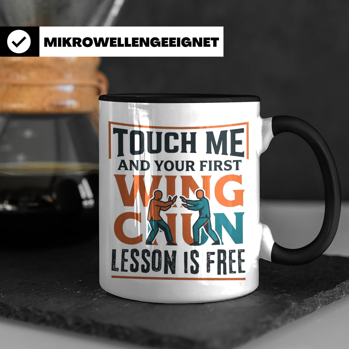 Wing Chun Tasse mit Spruch 'First Lesson is Free' Kampfsport – Schwarz [farbe:schwarz]