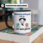 Gleitschirmfliegen Tasse mit Spruch 'ruft an ich muss geh'n' – Schwarz [farbe:schwarz]