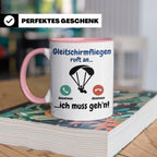 Gleitschirmfliegen Tasse mit Spruch 'ruft an ich muss geh'n' – Rosa [farbe:rosa]
