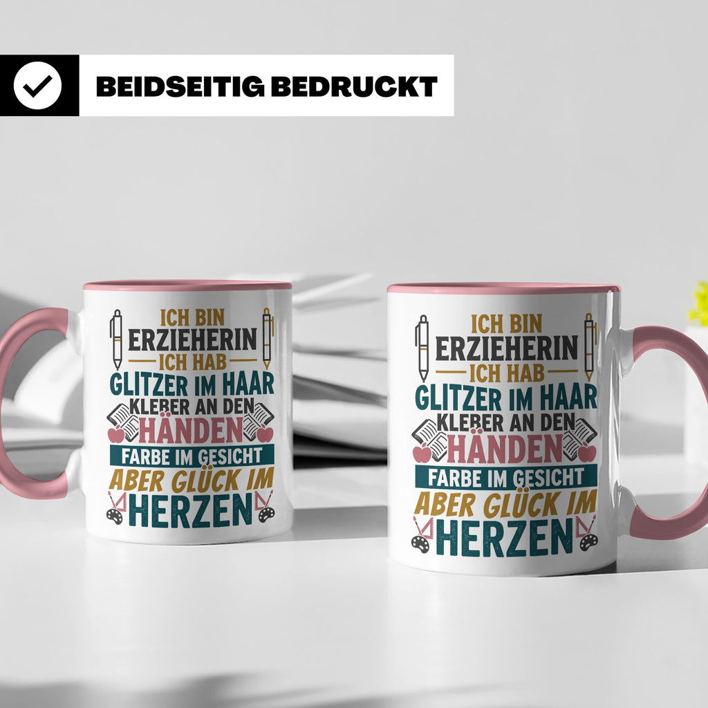 Erzieherin Tasse mit Spruch Glück im Herzen. Geschenk für Ki – Rosa [farbe:rosa]