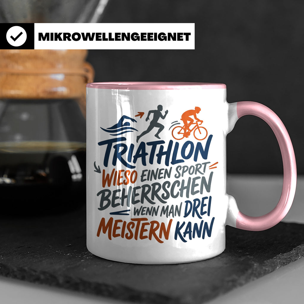 Triathlon Tasse mit Spruch Wieso einen Sport beherrschen, Ge – Rosa [farbe:rosa]