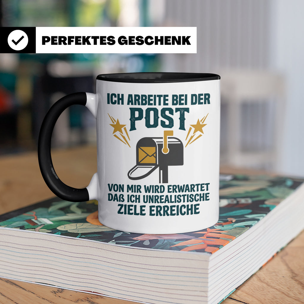 Postbote Tasse mit Spruch Unrealistische Ziele, Geschenk für – Schwarz [farbe:schwarz]