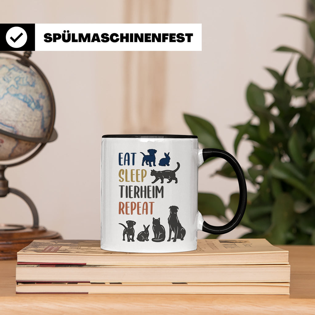 Tierheim Tasse mit Spruch Eat Sleep Repeat. Geschenk für Tie – Schwarz [farbe:schwarz]