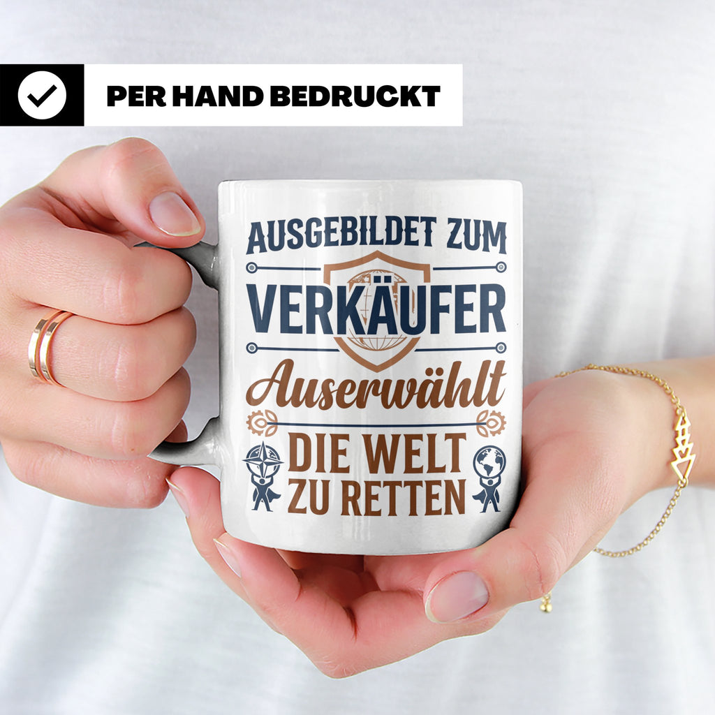 Verkäufer Tasse mit Spruch Auserwählt Welt zu retten Geschen – Weiß [farbe:weiß]