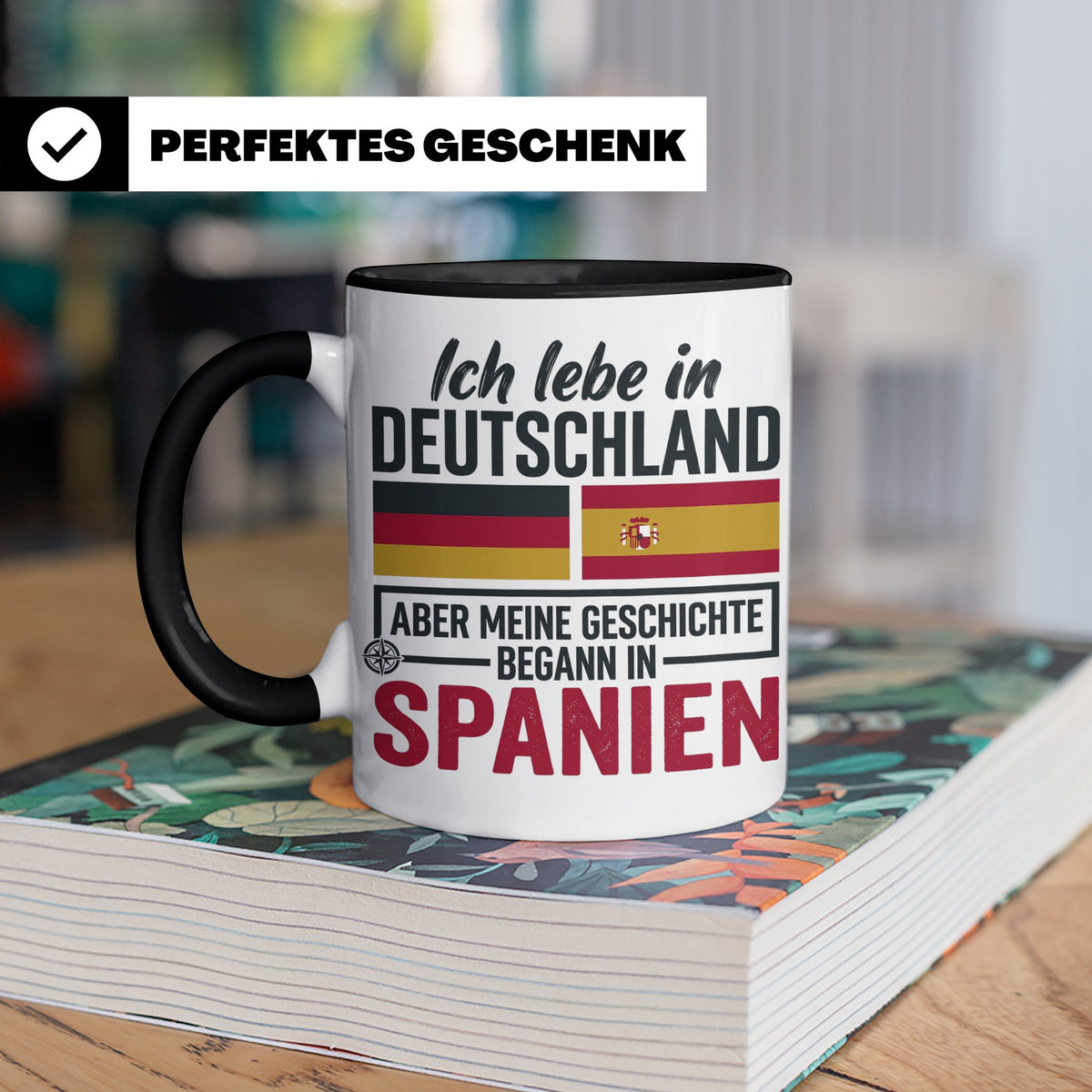 Spanier in Deutschland Tasse mit Spruch & Flagge. Geschenk f – Schwarz [farbe:schwarz]