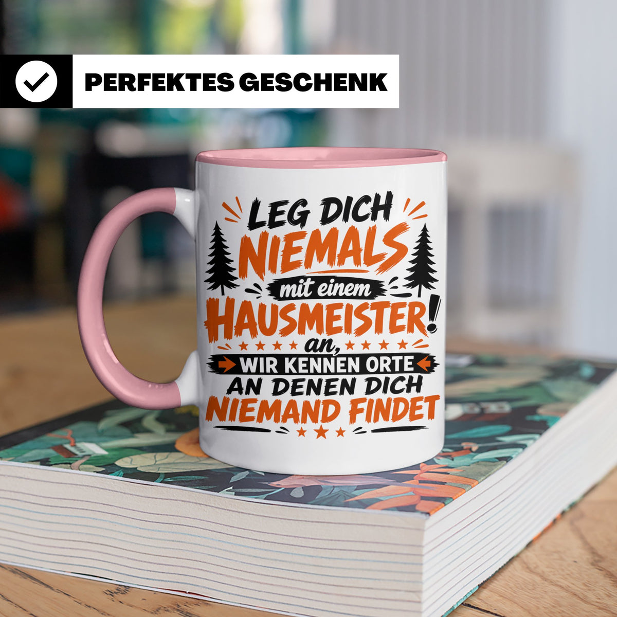 Hausmeister Tasse mit Spruch Leg dich niemals an | Geschenk  – Rosa [farbe:rosa]