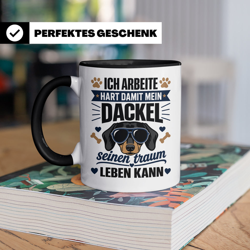 Dackel Tasse mit Spruch Ich arbeite hart damit mein Dackel.. – Schwarz [farbe:schwarz]