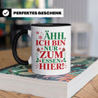Weihnachtstasse mit Spruch 'Ähh ich bin nur zum Essen hier'  – Schwarz [farbe:schwarz]