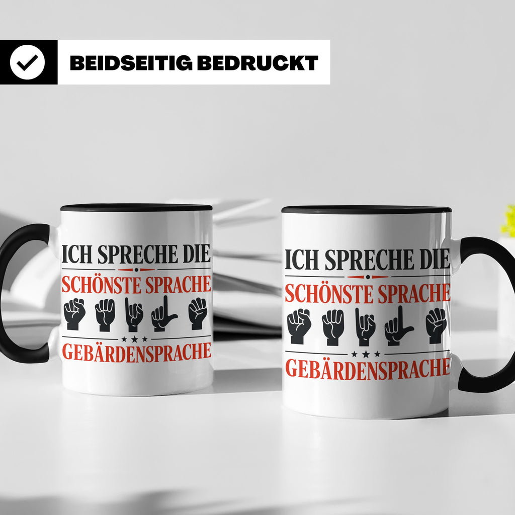 Gebärdensprache Tasse mit Spruch Ich spreche die schönste Sp – Schwarz [farbe:schwarz]