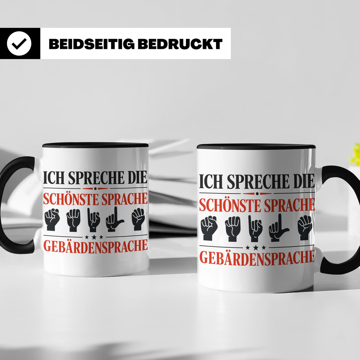 Gebärdensprache Tasse mit Spruch Ich spreche die schönste Sp – Schwarz [farbe:schwarz]