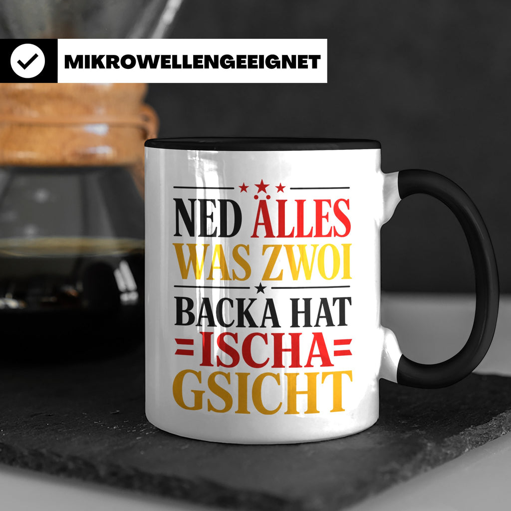 Schwäbische Tasse mit Spruch Ned alles was zwoi Backa hat |  – Schwarz [farbe:schwarz]
