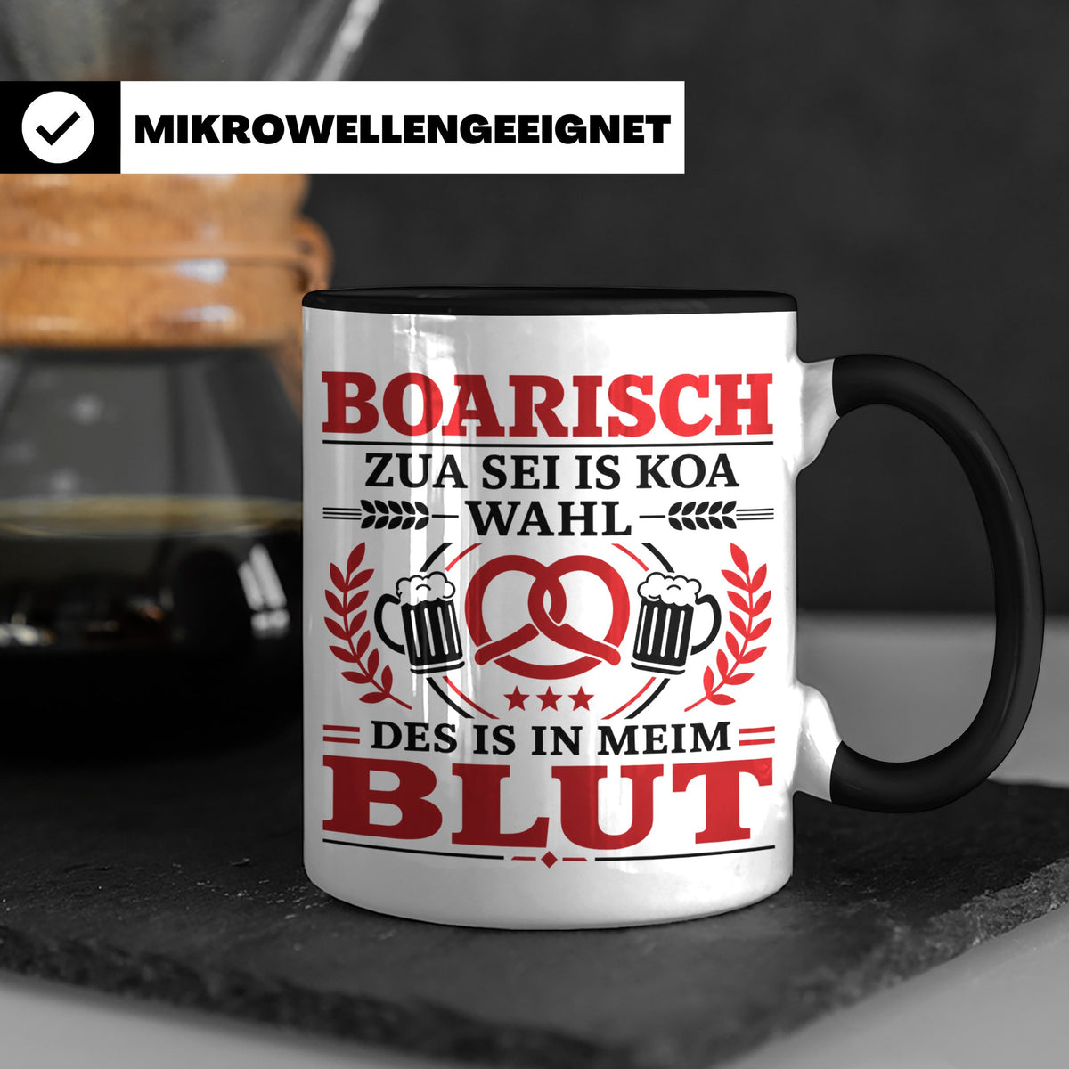 Boarisch Tasse mit Spruch Des is in meim Blut lustige Bayeri – Schwarz [farbe:schwarz]