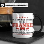 Franke Tasse mit Spruch Ich bin net sauer | Geschenk für Fra – Schwarz [farbe:schwarz]