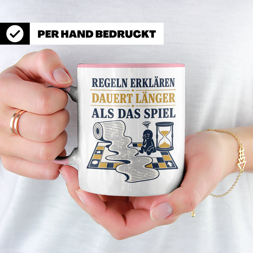 Brettspiel Tasse mit Spruch Regeln erklären dauert länger al – Rosa [farbe:rosa]
