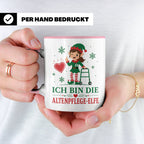 Altenpflege Weihnachten Tasse Ich bin die Altenpflege-Elfe - – Rosa [farbe:rosa]