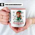 MFA Arzthelferin Weihnachten Tasse Ich bin die Praxis-Elfe - – Rot [farbe:rot]