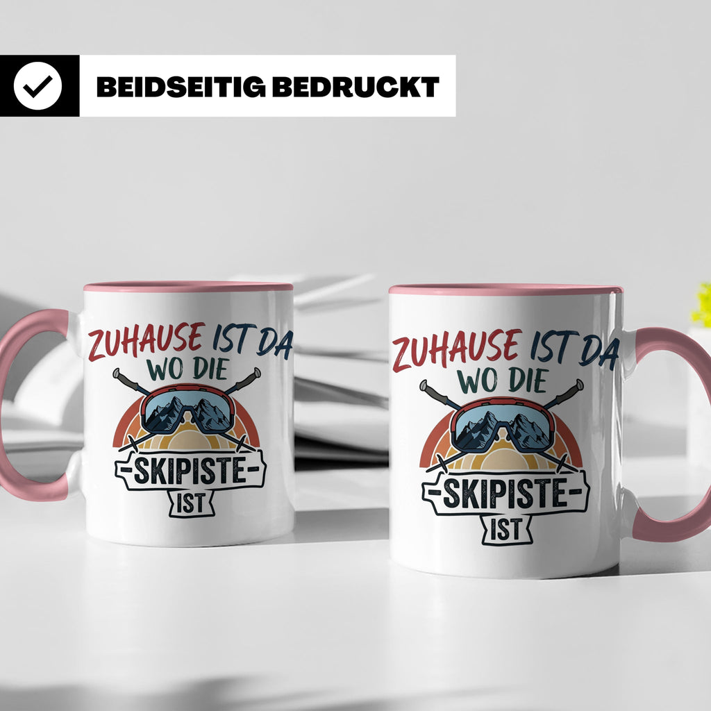 Skifahrer Tasse mit Spruch Zuhause ist da wo die Skipiste is – Rosa [farbe:rosa]